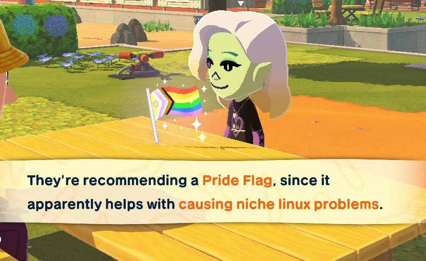 tomodachi life screenshot of a Mii sitting at a picnic table with a pride flag, captioned - They're recommending a pride flag, as it apparently helps with causing niche linux problems